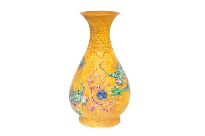 Lot 207 - A CHINESE MOULDED YELLOW-GROUND 'DRAGONS' VASE