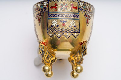 Lot 336 - An Alexander III late 19th century Russian 88 zolotnik silver gilt and champlevé enamel cup and saucer, Saint Petersburg circa 1890 by Theodor Nygren (active 1874-1898)