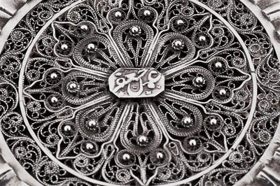 Lot 303 - An early 20th century Persian (Iranian) silver filigree dressing table jar, Zanjan circa 1920 marked Ja’far