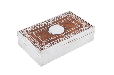 Lot 69 - A George V sterling silver and burr walnut cigarette box, London 1919 by Charles Lovell Simmonds (reg. 1916)