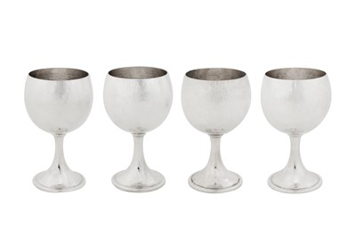 Lot 291 - A matched set of four late 20th century Italian sterling silver goblets, Milan circa 1980 by Buccellati