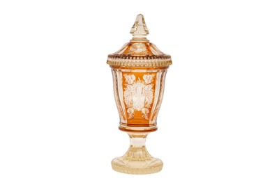 Lot 456 - A BOHEMIAN AMBER FLASH GLASS GOBLET AND COVER, LATE 19TH CENTURY