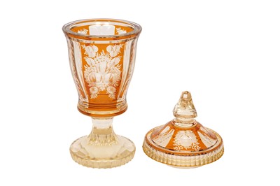 Lot 456 - A BOHEMIAN AMBER FLASH GLASS GOBLET AND COVER, LATE 19TH CENTURY