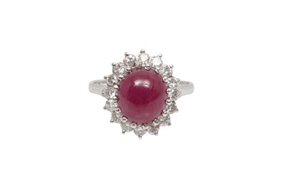 Lot 10 - A RUBY AND DIAMOND CLUSTER RING