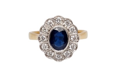 Lot 5 - A SAPPHIRE AND DIAMOND CLUSTER RING