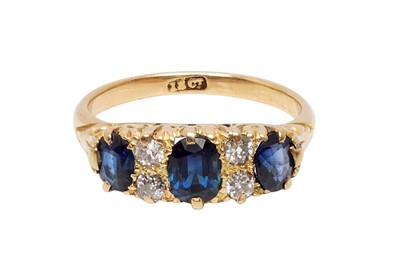 Lot 26 - A VICTORIAN-STYLE SAPPHIRE AND DIAMOND RING