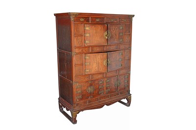 Lot 330 - A KOREAN ELM BRASS-MOUNTED THREE-TIER CABINET
