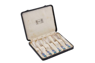 Lot 437 - A cased set of George V Arts and Crafts sterling silver and enamel cake forks, Birmingham 1931 designed by Archibald Knox for Liberty