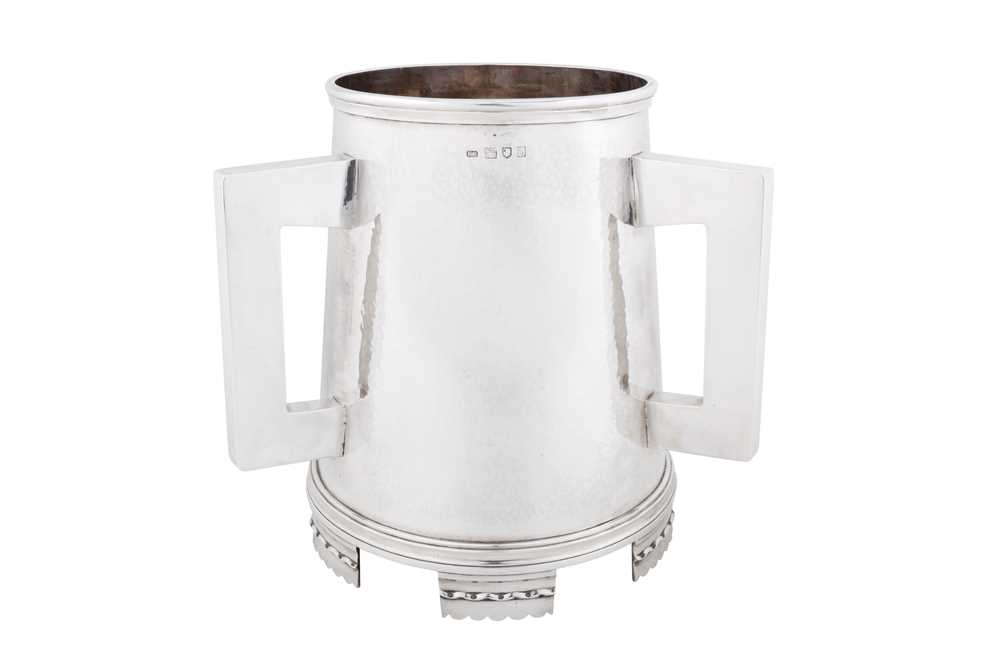Lot 482 - A large George V sterling silver tyg wine cooler, London 1914 by Kemp Brothers