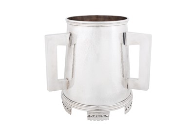 Lot 482 - A large George V sterling silver tyg wine cooler, London 1914 by Kemp Brothers