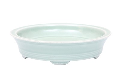 Lot 169 - A CHINESE MONOCHROME CELADON-GLAZED WASHER