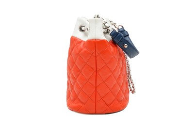Lot 52 - Chanel Red Tri Colour CC Chain Bucket Bag