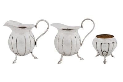 Lot 369 - A pair of late 20th century Maltese 917 standard silver milk jugs, circa 1980 by Giuseppe Aquilina (reg. 16 Aug 1947)