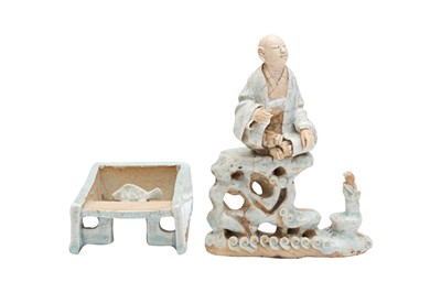 Lot 294 - A CHINESE HUTIAN-WARE QINGBAI FIGURE AND A BRUSH WASHER