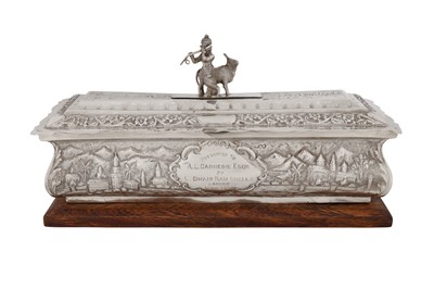 Lot 191 - An early 20th century Anglo – Indian unmarked silver scroll casket, Karachi dated 1939