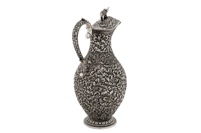 Lot 204 - A late 19th Anglo – Indian unmarked silver ewer or claret jug, Cutch circa 1880