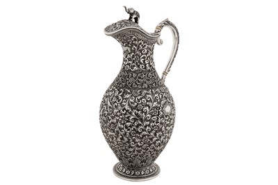 Lot 204 - A late 19th Anglo – Indian unmarked silver ewer or claret jug, Cutch circa 1880