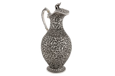 Lot 204 - A late 19th Anglo – Indian unmarked silver ewer or claret jug, Cutch circa 1880