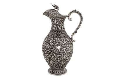 Lot 204 - A late 19th Anglo – Indian unmarked silver ewer or claret jug, Cutch circa 1880