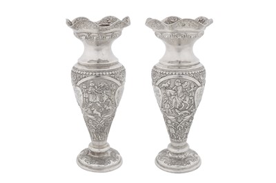 Lot A pair of early 20th century Persian (Iranian) unmarked silver vases, Kermanshah circa 1930