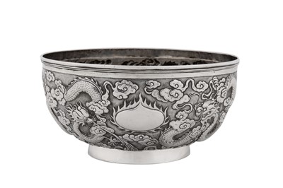 Lot A late 19th century Chinese export silver bowl, Shanghai circa 1890, marked Kun He, retailed by Cum Shing of Canton