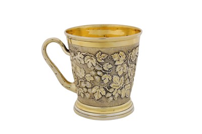 Lot A Victorian sterling silver gilt ‘fruiting vine’ mug, London 1881 by John Mortimer Hunt and Robert Roskell