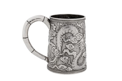 Lot 256 - An early 20th century Chinese export silver small mug, Shanghai circa 1910, marked Ming Ji, retailed by Tuck Chang of Shanghai