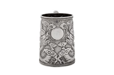 Lot 256 - An early 20th century Chinese export silver small mug, Shanghai circa 1910, marked Ming Ji, retailed by Tuck Chang of Shanghai