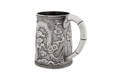 Lot 256 - An early 20th century Chinese export silver small mug, Shanghai circa 1910, marked Ming Ji, retailed by Tuck Chang of Shanghai