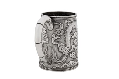 Lot 256 - An early 20th century Chinese export silver small mug, Shanghai circa 1910, marked Ming Ji, retailed by Tuck Chang of Shanghai