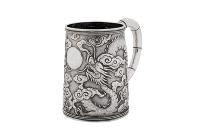 Lot 256 - An early 20th century Chinese export silver small mug, Shanghai circa 1910, marked Ming Ji, retailed by Tuck Chang of Shanghai