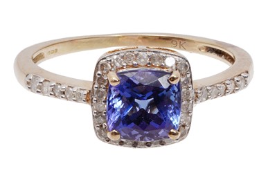 Lot 2 - A 9CT TANZANITE AND DIAMOND HALO CLSUTER RING