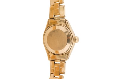 Lot 242 - A LADY'S GOLD ROLEX OYSTER PERPETUAL DATE BRACELET WATCH
