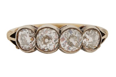 Lot 317 - A FOUR-STONE DIAMOND RING