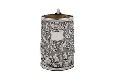 Lot 264 - A late 19th / early 20th century Chinese export silver small mug, Canton circa 1900, marked Zhao Ji, retailed by Wo Long