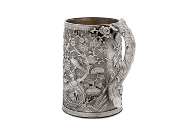 Lot 264 - A late 19th / early 20th century Chinese export silver small mug, Canton circa 1900, marked Zhao Ji, retailed by Wo Long