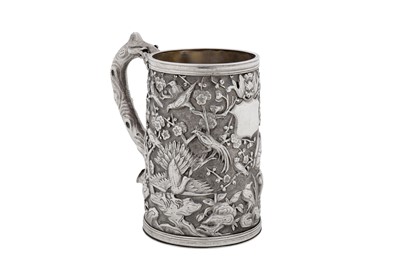 Lot 264 - A late 19th / early 20th century Chinese export silver small mug, Canton circa 1900, marked Zhao Ji, retailed by Wo Long