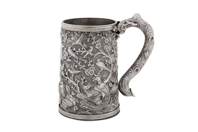 Lot 264 - A late 19th / early 20th century Chinese export silver small mug, Canton circa 1900, marked Zhao Ji, retailed by Wo Long