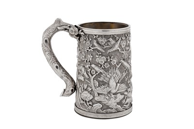 Lot A late 19th / early 20th century Chinese export silver small mug, Canton circa 1900, marked Zhao Ji, retailed by Wo Long