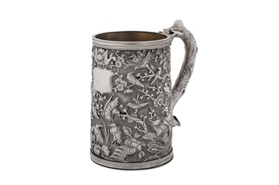 Lot 264 - A late 19th / early 20th century Chinese export silver small mug, Canton circa 1900, marked Zhao Ji, retailed by Wo Long
