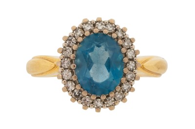 Lot 362 - A TOPAZ AND DIAMOND CLUSTER RING, CIRCA 1989