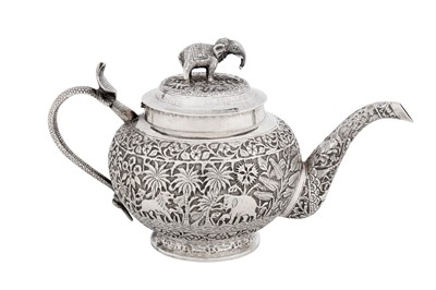 Lot A late 19th / early 20th century Anglo – Indian unmarked silver teapot, Lucknow circa 1900