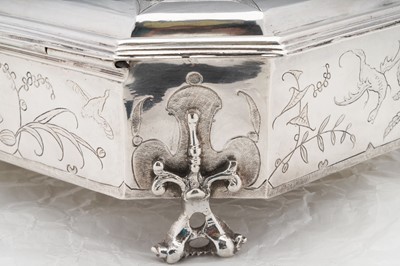 Lot 577 - A pair of Charles II sterling silver chinoiserie toilet caskets, London 1683 by Ralph Leake (free 1671)