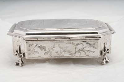 Lot 577 - A pair of Charles II sterling silver chinoiserie toilet caskets, London 1683 by Ralph Leake (free 1671)