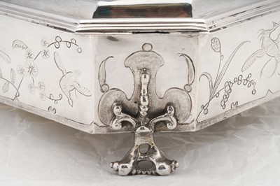 Lot 577 - A pair of Charles II sterling silver chinoiserie toilet caskets, London 1683 by Ralph Leake (free 1671)