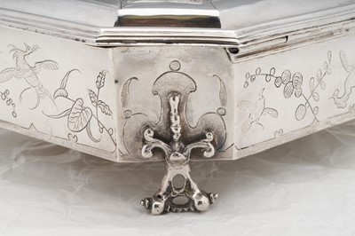 Lot 577 - A pair of Charles II sterling silver chinoiserie toilet caskets, London 1683 by Ralph Leake (free 1671)