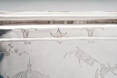 Lot 577 - A pair of Charles II sterling silver chinoiserie toilet caskets, London 1683 by Ralph Leake (free 1671)