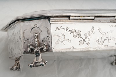 Lot 577 - A pair of Charles II sterling silver chinoiserie toilet caskets, London 1683 by Ralph Leake (free 1671)