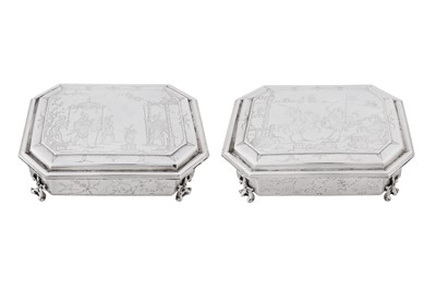 Lot 577 - A pair of Charles II sterling silver chinoiserie toilet caskets, London 1683 by Ralph Leake (free 1671)