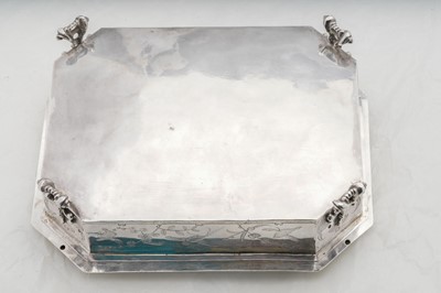 Lot 577 - A pair of Charles II sterling silver chinoiserie toilet caskets, London 1683 by Ralph Leake (free 1671)